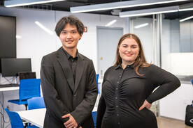 Symposium 2025 Dengyi and Chana Pose